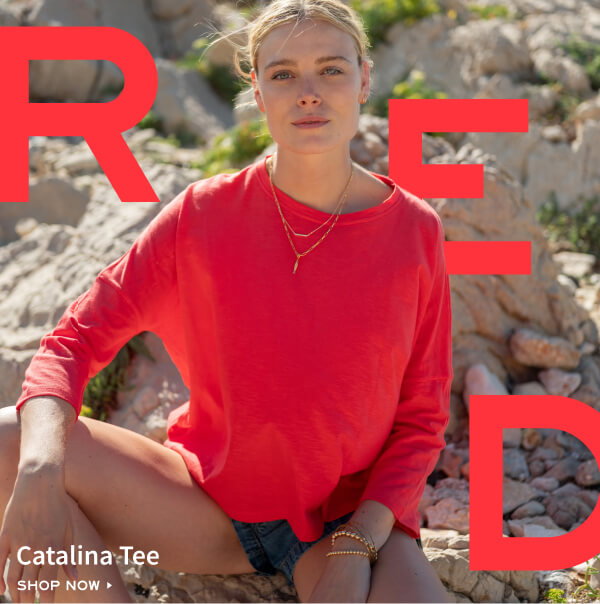 Catalina Tee - Shop now - Image of a woman on a beach wearing a red long sleeve tee
