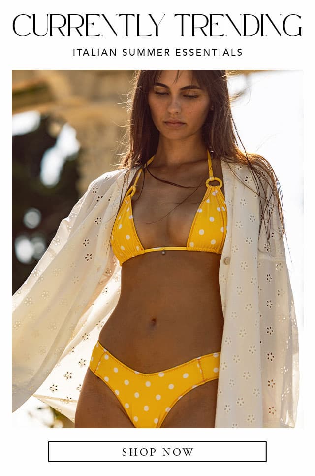 Model wearing yellow polka dot bikini. Shop now. 