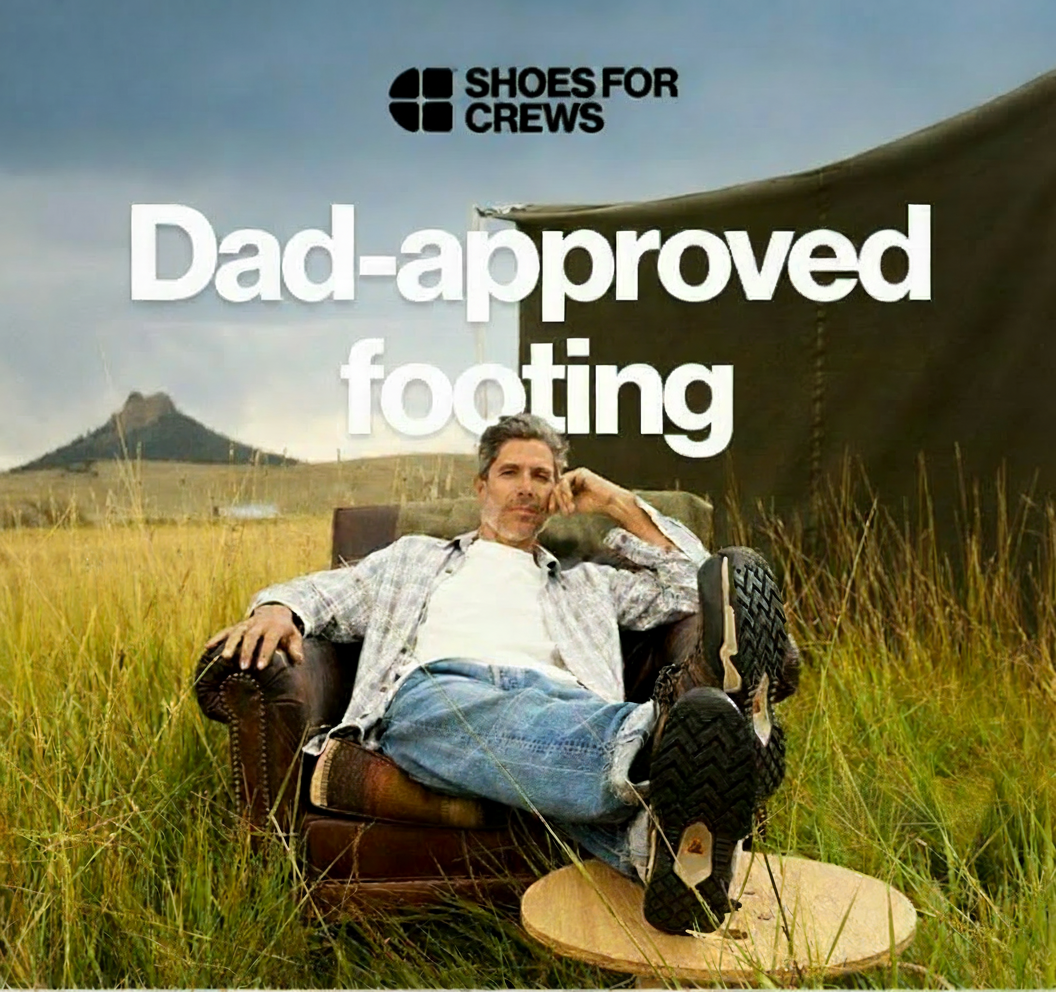 Man in armchair with feet up, wearing Shoes for Crews, with text "Dad-approved footing".