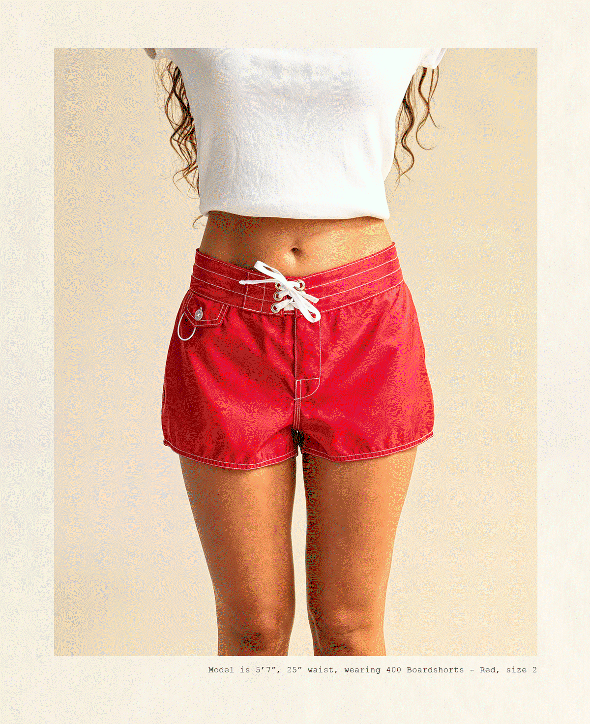Model is 5'7", 25" waist, wearing 400 Boardshorts - Red, size 2