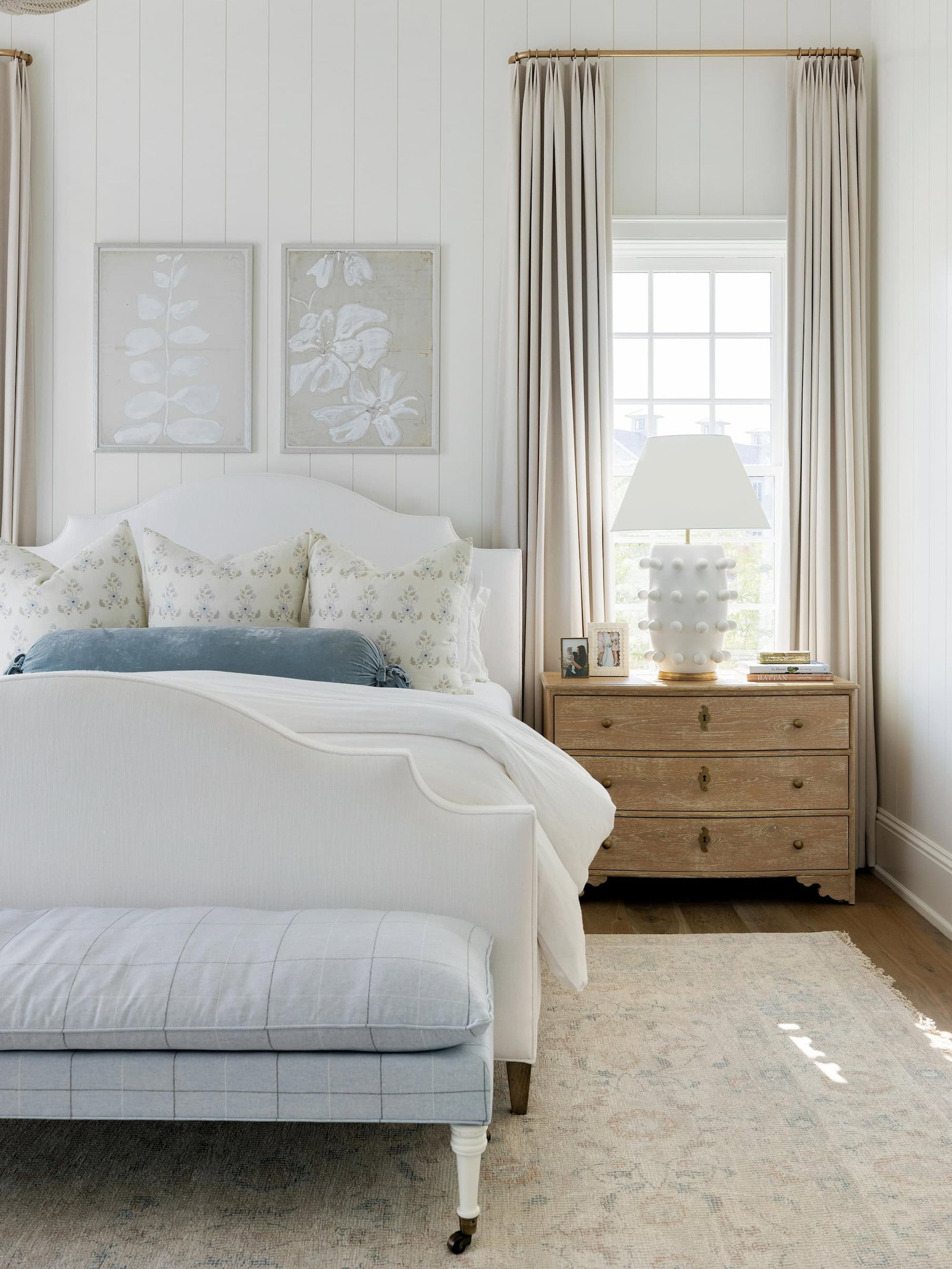 Coastal, serene primary bedroom with Julia Rug.