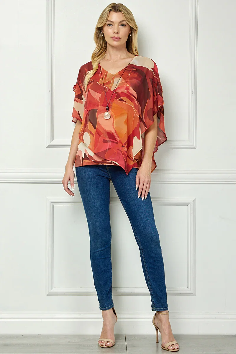 Image of Cold Shoulder V-Neck Hanky Hem Poncho Top in Ivory/Marigold/Orange