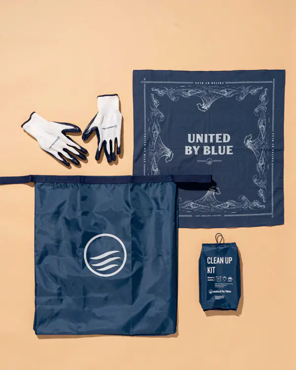 The United by Blue Cleanup Kit: a recycled trash bag, work gloves, a UBB bandana, and a carry pouch.