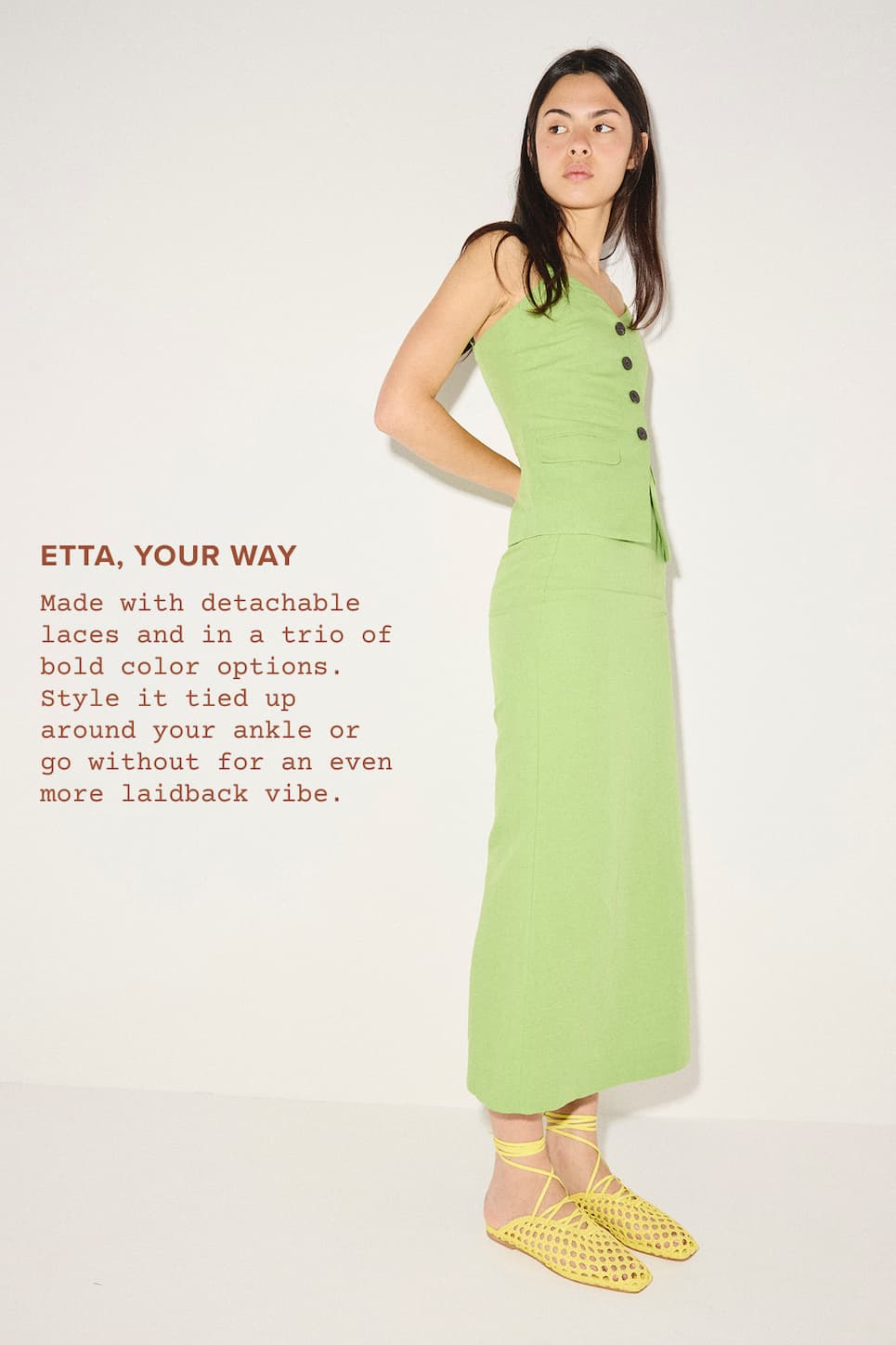 woman in green dress with neon yellow woven slides with ankle ties 