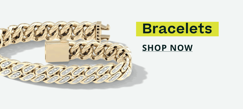 Thick Cuban link in gold with pavé-set stones. Bracelets. Click here to shop now