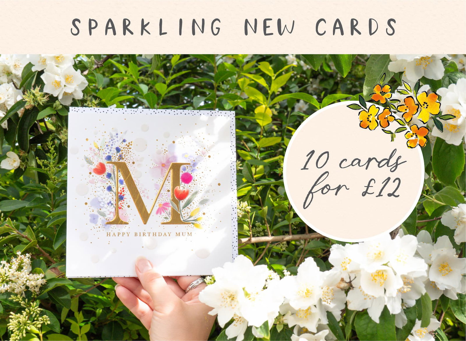 A luxury birthday card displayed amongst flowering garden blooms, featuring gold foil details and hand painted floral artwork. Shop new Whistlefish greeting cards, 10 cards for £12.