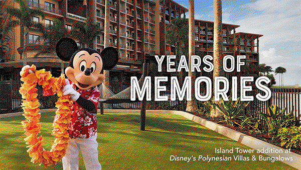 Mickey poses in front of Island Tower at Disney's Polynesian Villas and Bungalows.