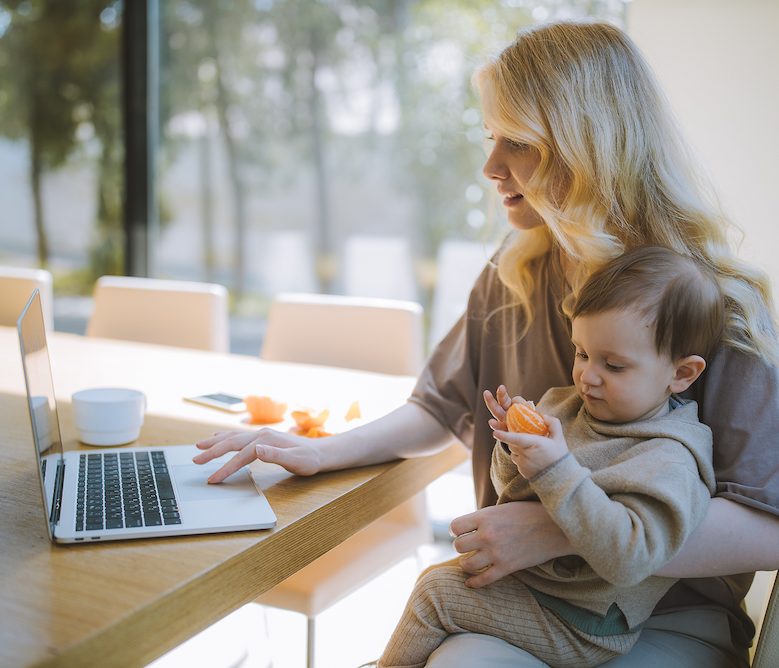 Mom online shopping with baby