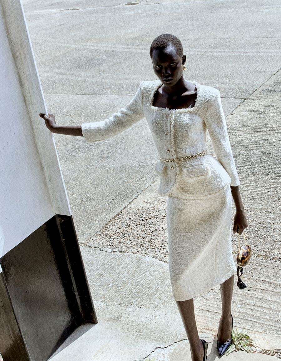 A picture of a woman wearing the Cream Boucle Tailored Chain Midi Dress