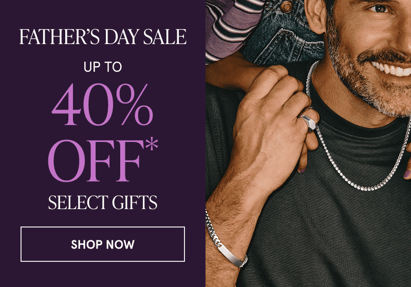 A child embraces a parent wearing diamond jewelry. Father’s Day Sale. Up to 40% off select gifts. Click here to shop now
