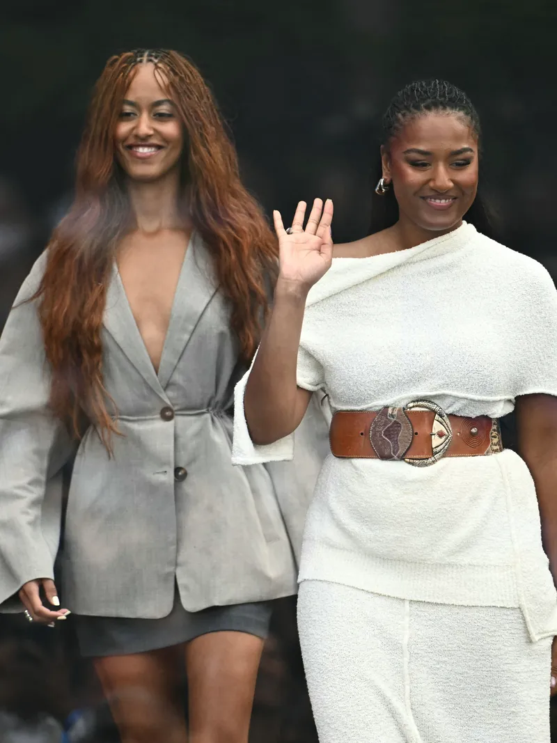 Malia (L) and Sasha Obama, daughters of former US president Barack Obama and his wife Michelle Obama, arrive at the opening of the Barack Obama Presidential Center in Chicago, Illinois, on June 18, 2026. (Photo by Kent NISHIMURA / AFP via Getty Images)