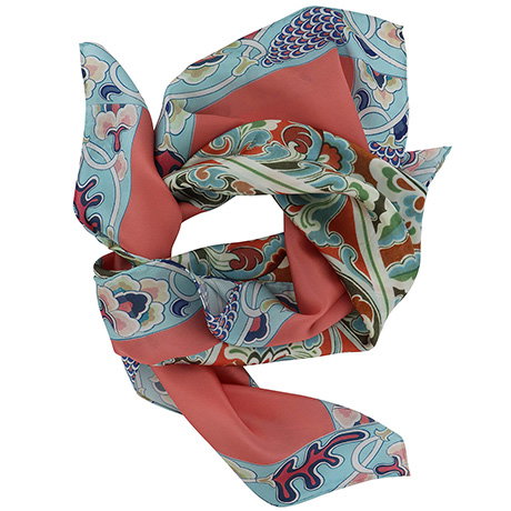 Silk scarf featuring a lotus motif inspired by the decorative ceilings of the Mogao Caves. - Shop Now.
