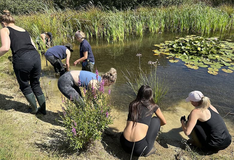 Ancient + Brave employee volunteers at Ouse River