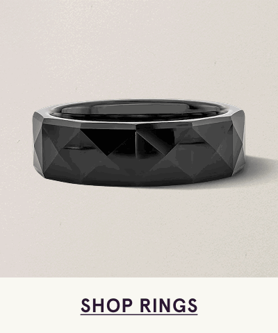 Bold, matte black signet ring with diamond-shaped textured face. Click here to shop rings