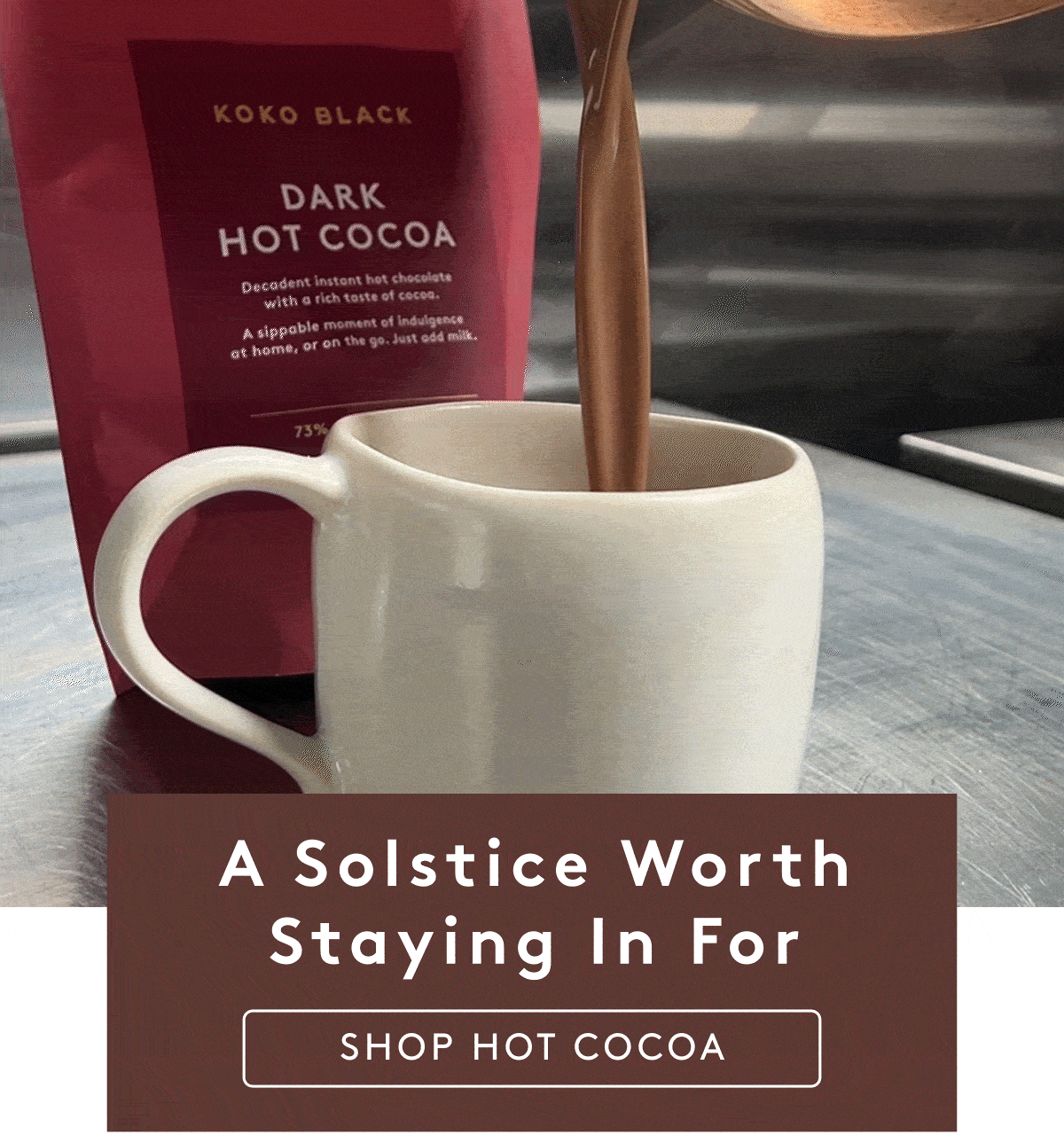 Hot cocoa being poured into a mug