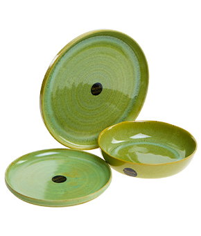 Green ribbed glass bowl.