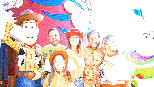 A gif of Woody and Jessie at breakfast, Mrs. Incredible striking a super pose and Mike and Sulley on the deck