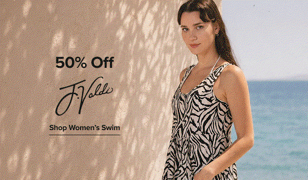 Image of a woman on the beach in a white cover-up. 50% off. J Valdi logo. Shop women's swim.
