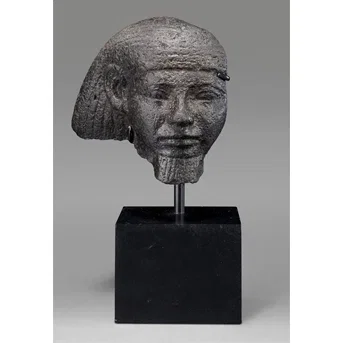 A Fragmentary Egyptian Basalt Portrait Head