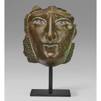 A Roman Copper Alloy Mask From a Cavalry Sport or Parade Helmet