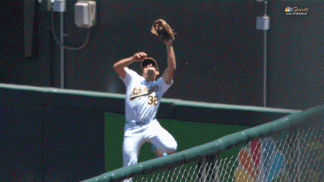 An animated gif of Colby Thomas robbing a home run