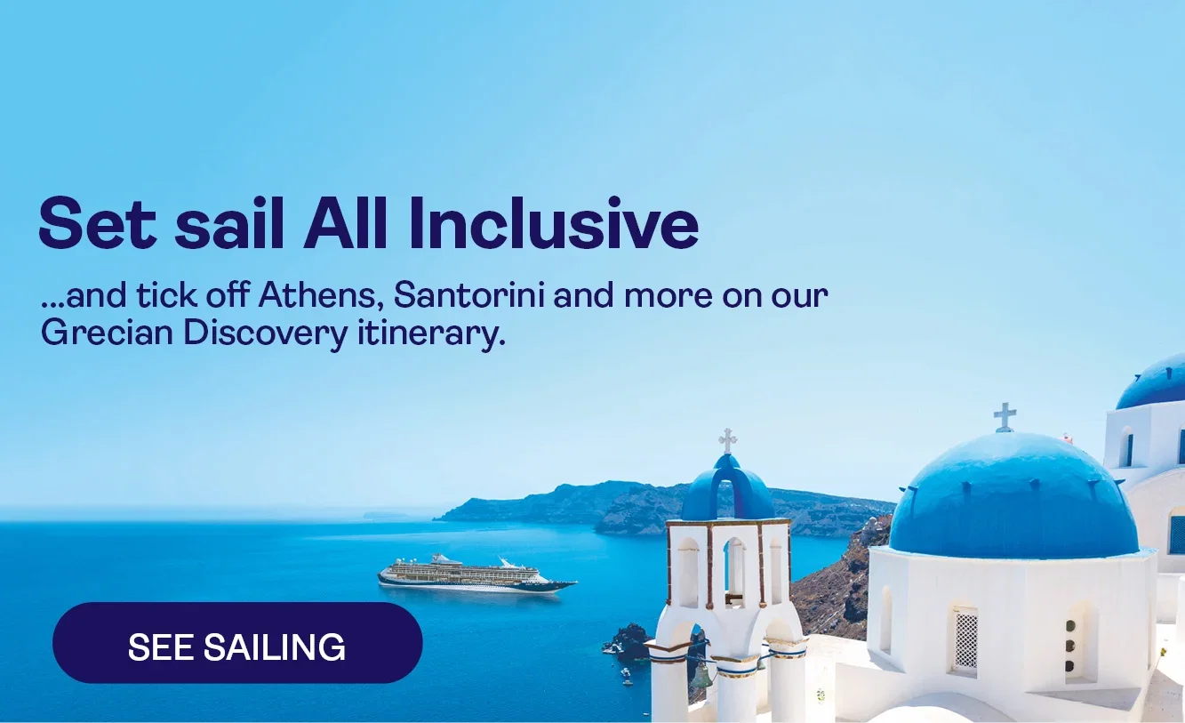 Marella cruise ship sailing past the Greek coastline, surrounded by clear blue sea and sunlit island scenery.