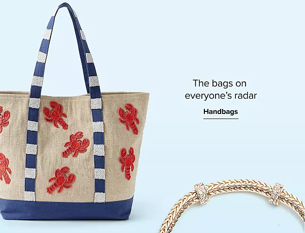 A tote bag with lobster patches. The bags on everyones radar. Handbags.