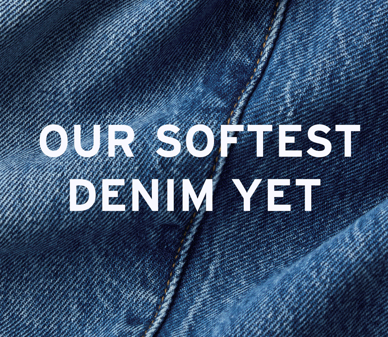 Gif of white letters over a denim background that reads "OUR SOFTEST DENIM YET"