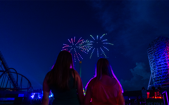 Friends enjoying fireworks at Busch Gardens
