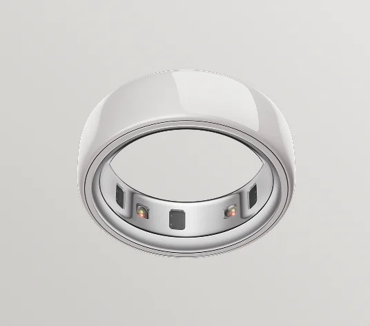 Oura Ring 4 in cloud finish, viewed from below showing recessed health sensors