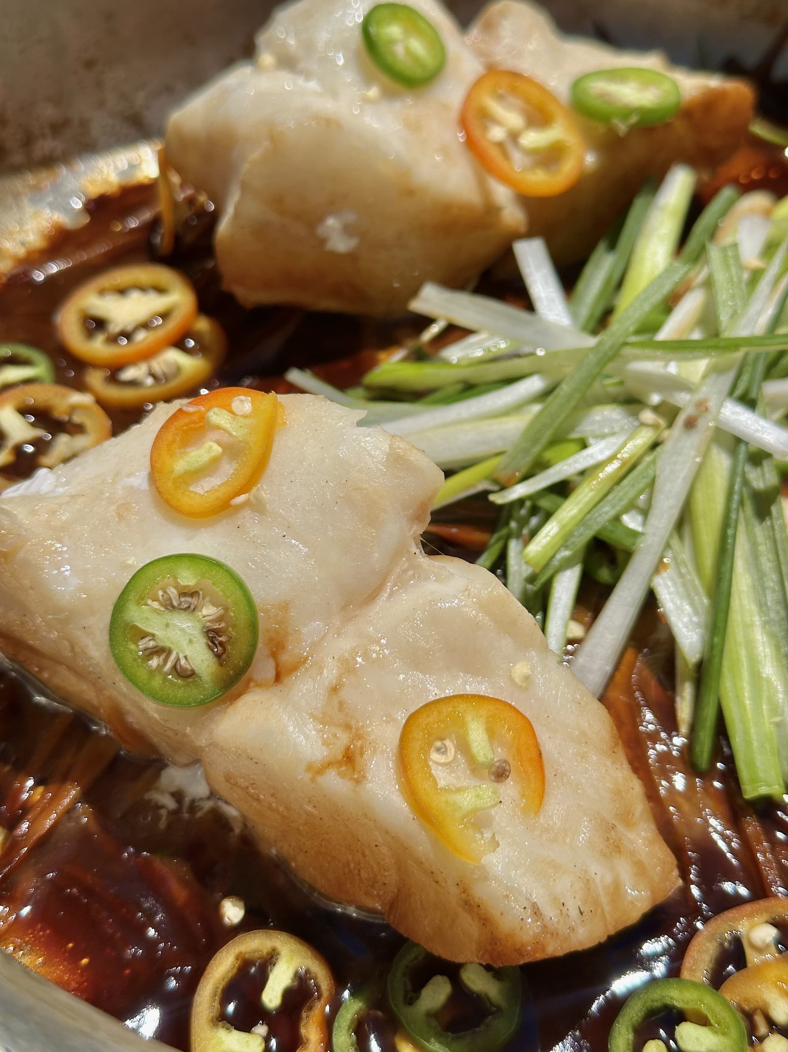 yelloweye rockfish on bed of vegetables