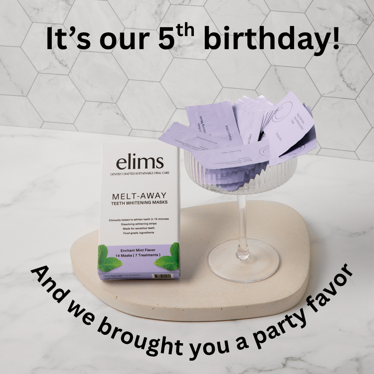 image of a melt away teeth whitening mask delicately seen on a modern background with a martini glass filled with whitening masks