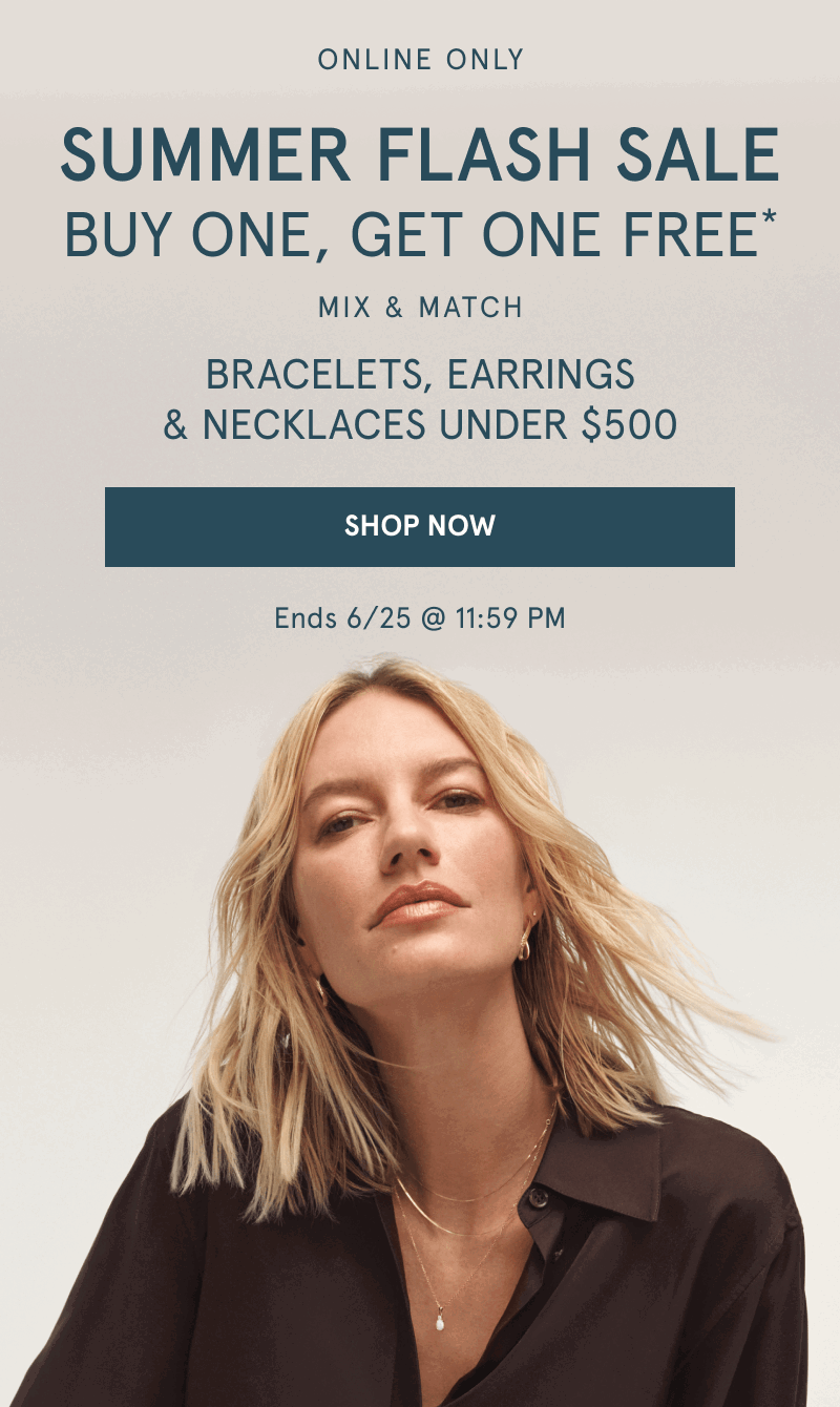 Woman wearing layered yellow gold chains and stacked earrings. Buy one, get one free. Jewelry under $500. Click shop now.