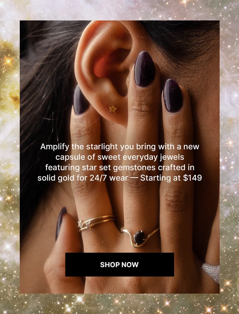 image featuring a hand that has some rings on it pressed up against a face showing an ear with a star gold earring, very celestial vibes with a galactic background around the image
