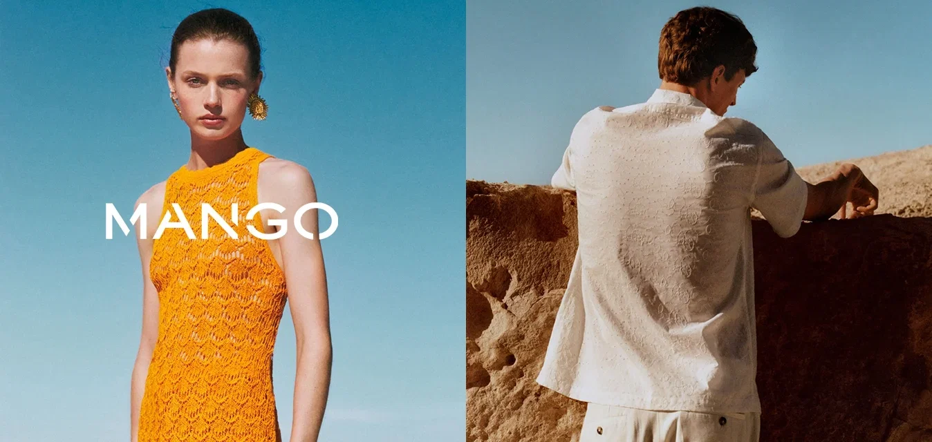 Orange gehäkeltes ärmelloses Kleid mit einem gewellten Muster, kombiniert mit einem strukturierten weißen Kurzarmhemd in einer natürlichen Umgebung.