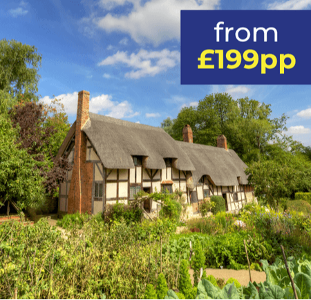 Thatched cottage surrounded by greenery and flowers, with a promotional banner in the corner.