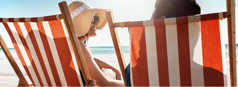 Two people on a sunny beach