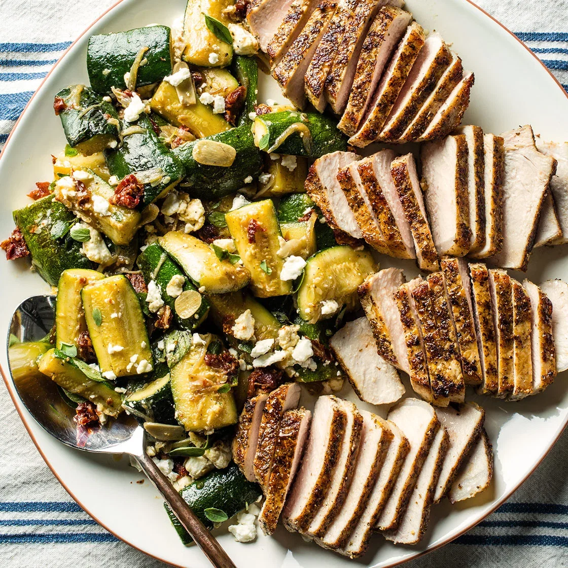 Greek-Spiced Pork Chops with Warm Zucchini-Feta Salad