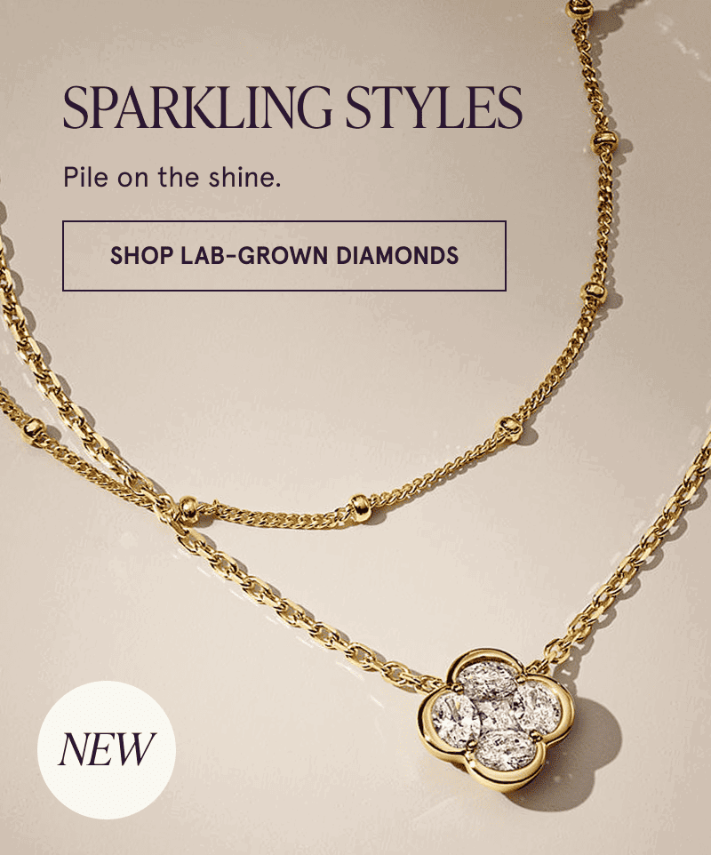 A gold station chain and a gold diamond chain with a floral pendant. Click here to shop lab-grown diamonds