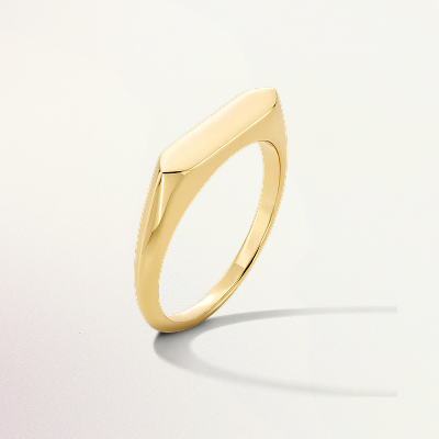 A gold hexagonal signet ring.