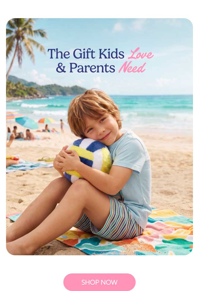 A boy hugging Volleyball Warmies. Shop Now.