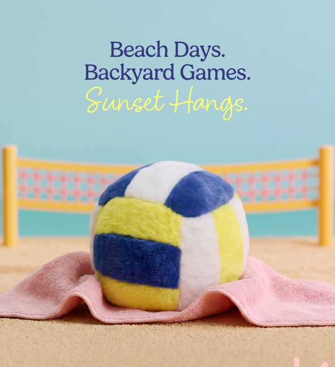 Volleyball Warmies on a beach. Shop Now.