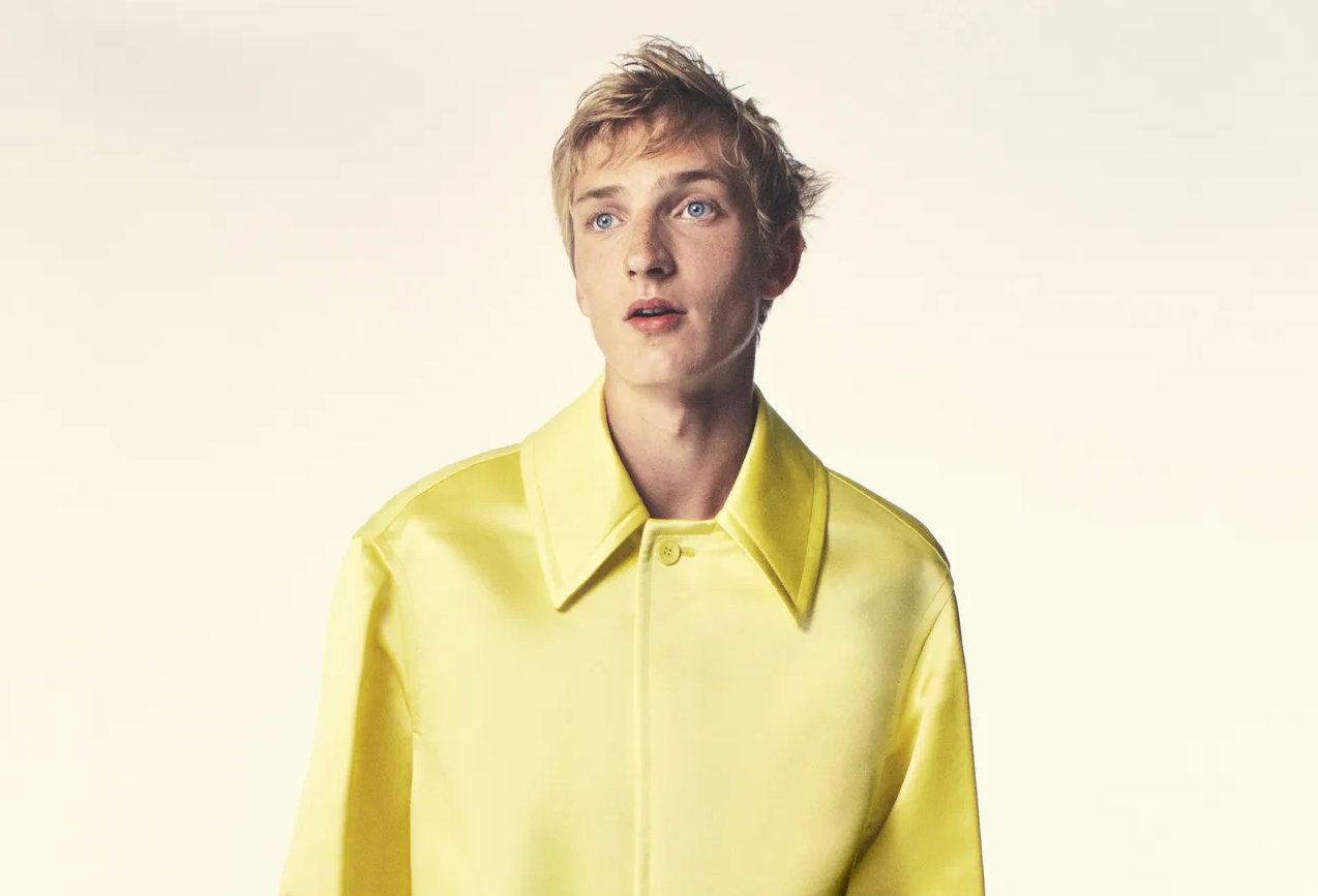 male model in yellow raincoat