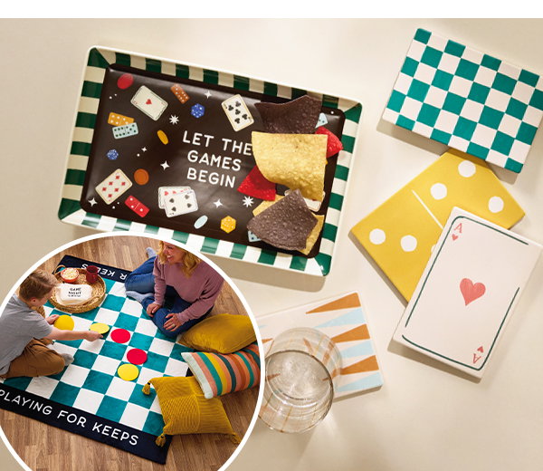 Family playing on game night checkboard blanket with snack tray and oversized coasters.