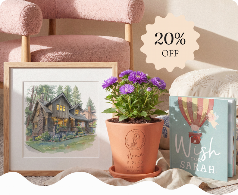 Display of personalised gifts including framed illustrations, a personalised book, wrapped presents, and an engraved plant pot on a shelf
