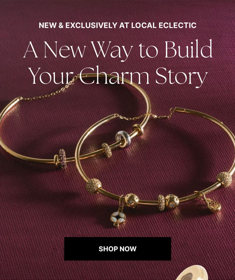 new solid gold customizable charm bracelet crafted in solid gold from Family Gold & Local Eclectic.  picture features bracelets with a variety of charms