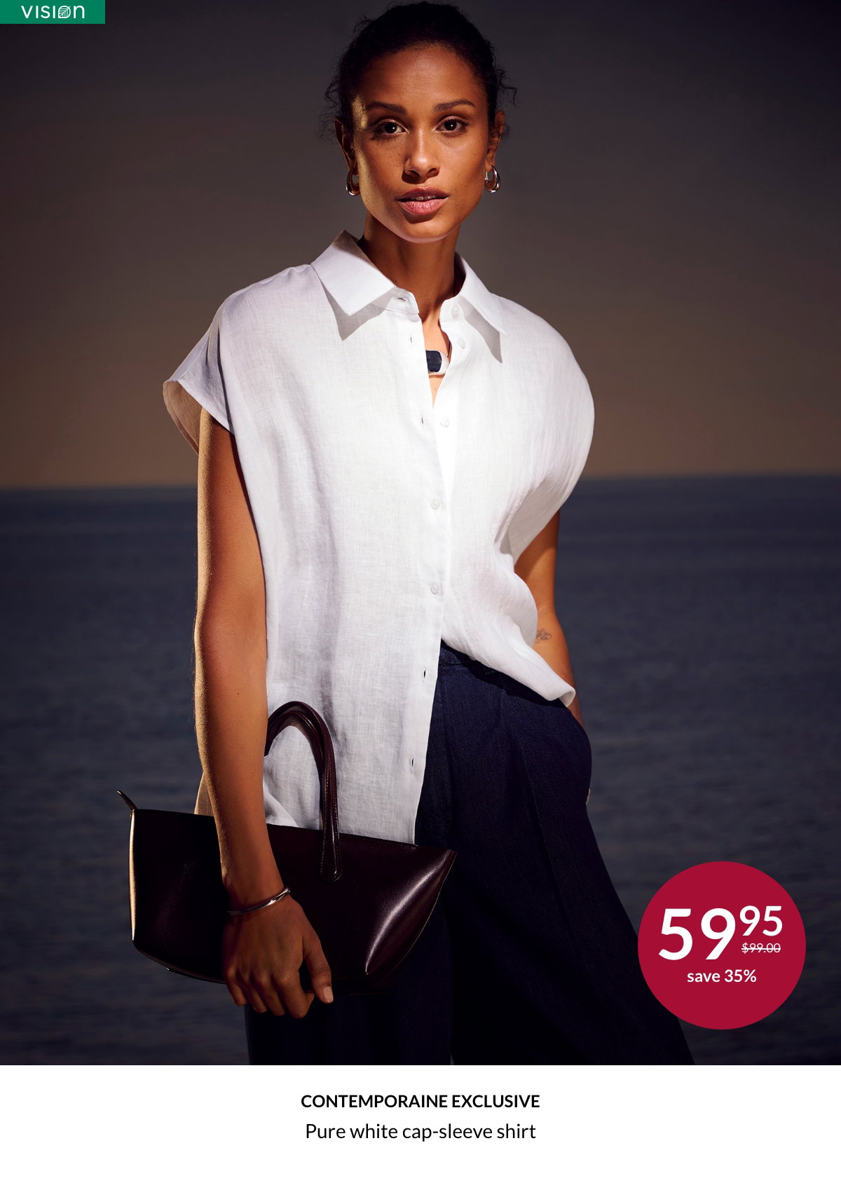 Woman wearing a pure white cap-sleeve shirt at 59.95$ instead of 99.00$
