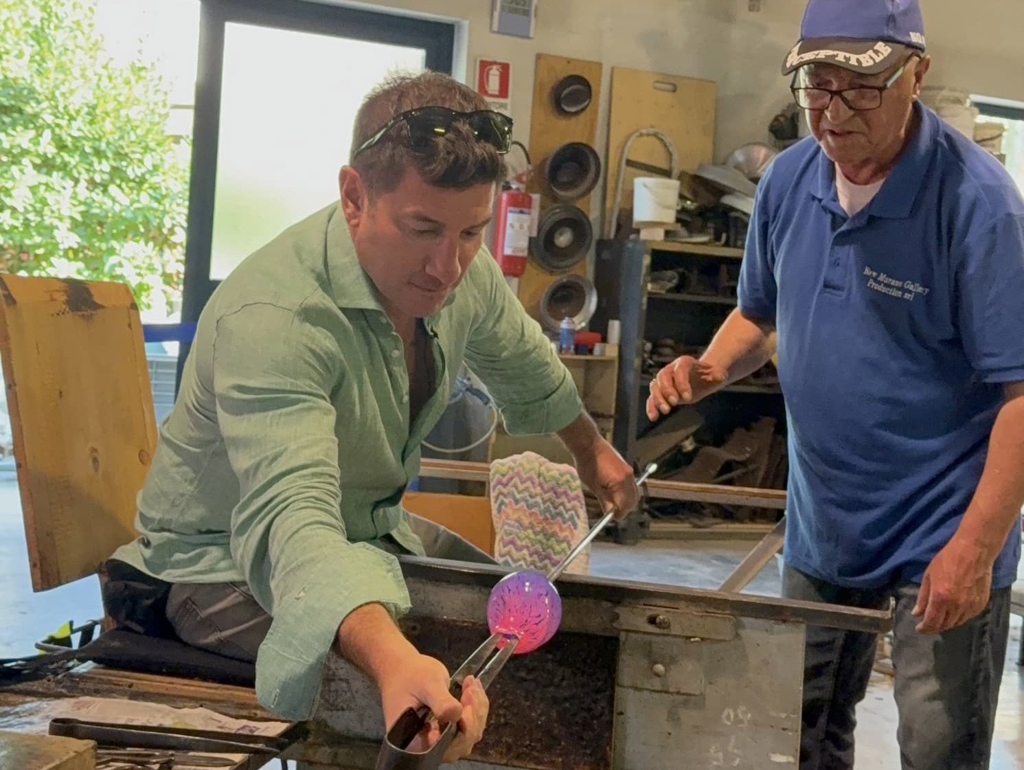 Brandon learning to blow glass on Murano island