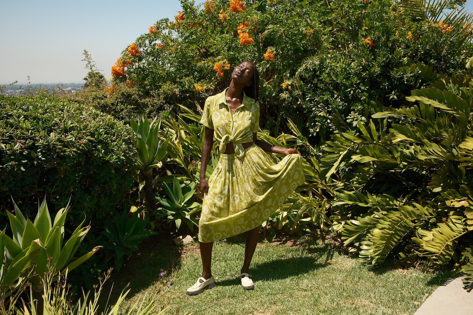 model in aloe outfit