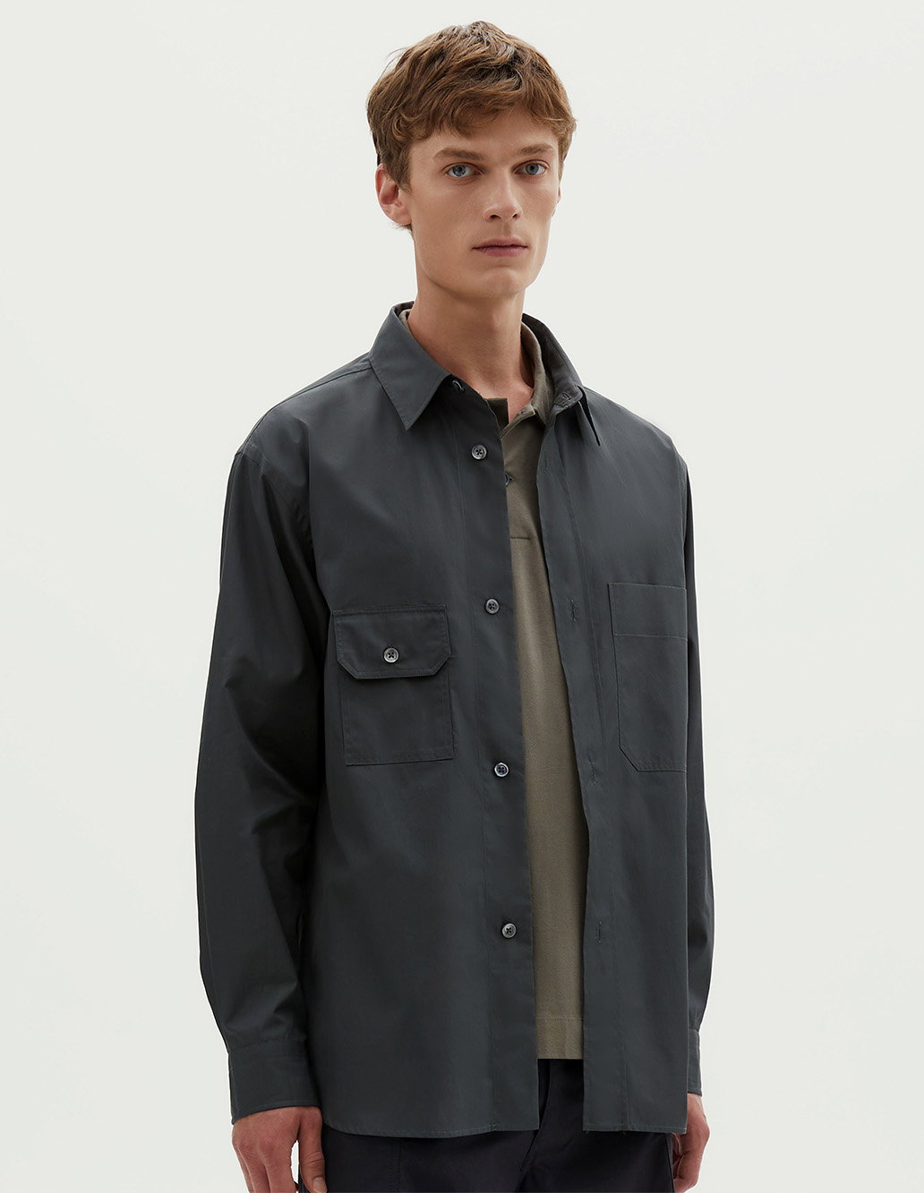 Dark cotton shirt.